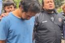 DBM (kaos biru) terduga pelaku pembunuhan keji terhadap Ibu dan Anak di Madiun ketika diamankan Ditreskrimum Polda Jatim. Foto/Ist